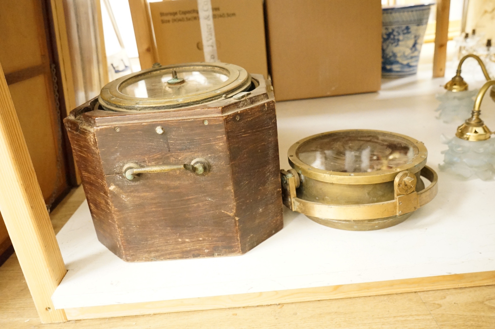 Two ships compasses, on gimbal mounts, largest 35cm. Condition - fair
